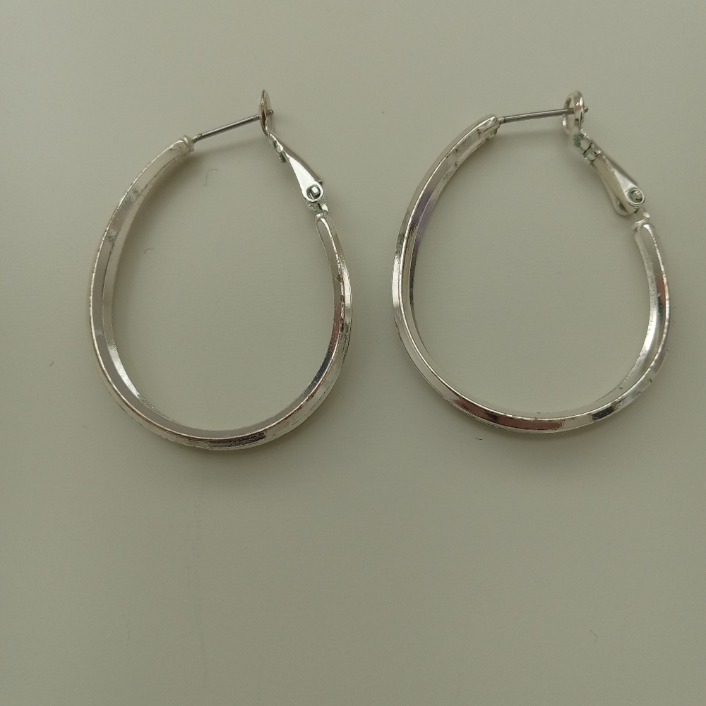 Costume jewelry silver hoop earrings